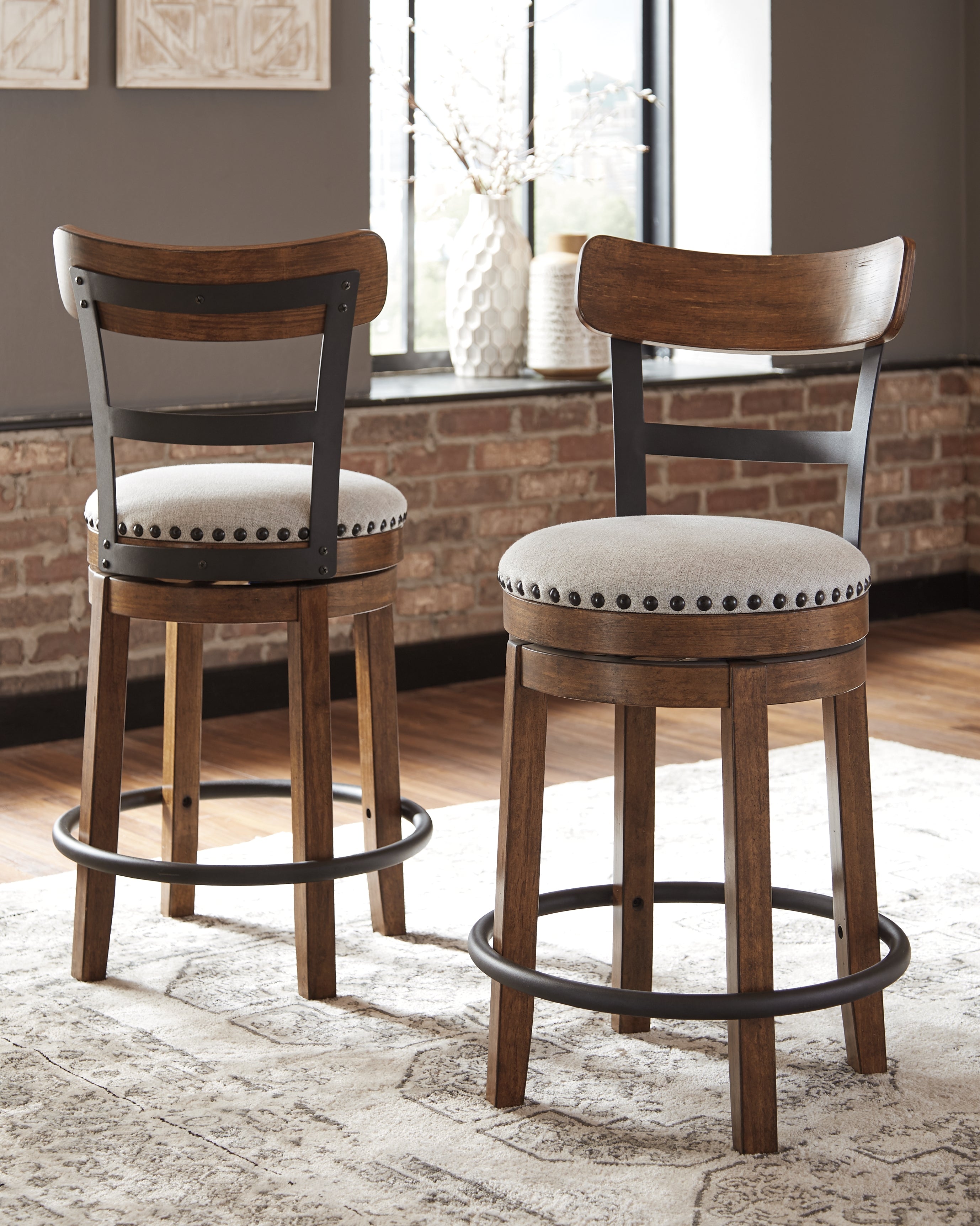 Lullora Furniture - Ashley Furniture - Valebeck Dining Room - UPH Swivel Barstool (1/CN) / Brown - D546-424