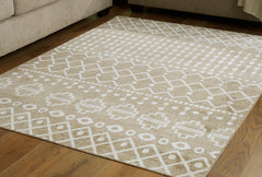 Lullora Furniture - Ashley Furniture - Bunchly Rug - 4'11" x 7'2" Washable Rug / Tan/Brown/Cream - R406222