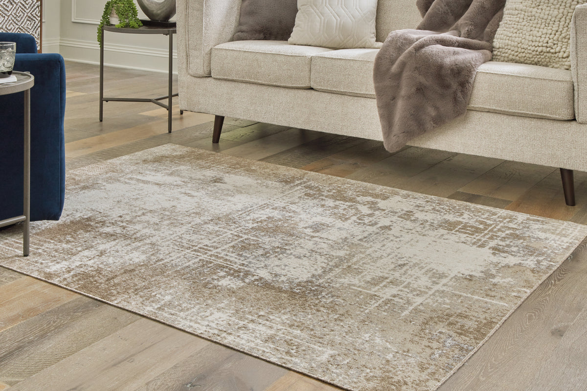 Lullora Furniture - Ashley Furniture - Grifflain Rug - 5'1" x 7' Washable Rug / Tan/Brown/Gray - R406232
