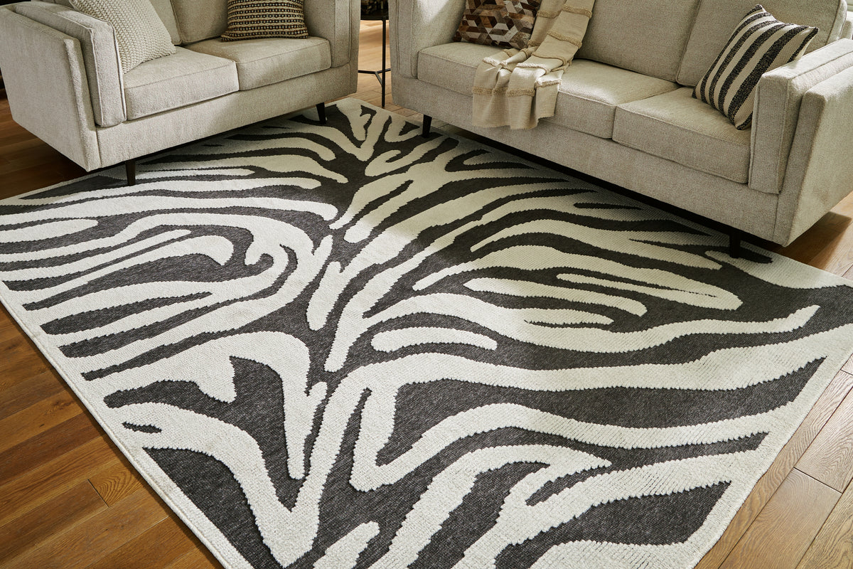 Lullora Furniture - Ashley Furniture - Thomwith Rug - 8' x 10'2" Washable Rug / Black/Ivory - R406291