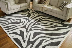 Lullora Furniture - Ashley Furniture - Thomwith Rug - 8' x 10'2" Washable Rug / Black/Ivory - R406291