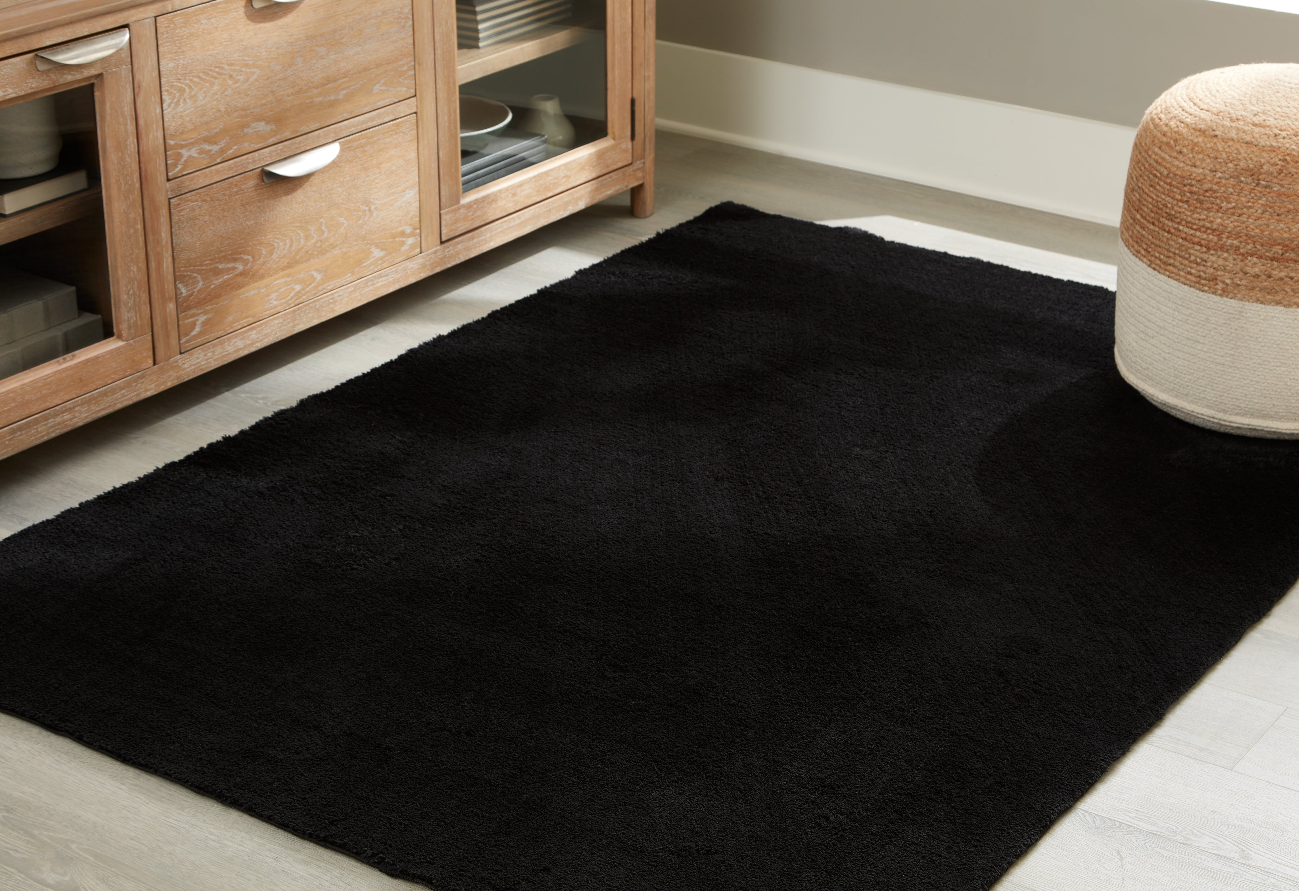 Lullora Furniture - Ashley Furniture - Anaben Rug - 5' x 7' Washable Rug / Black - R406312
