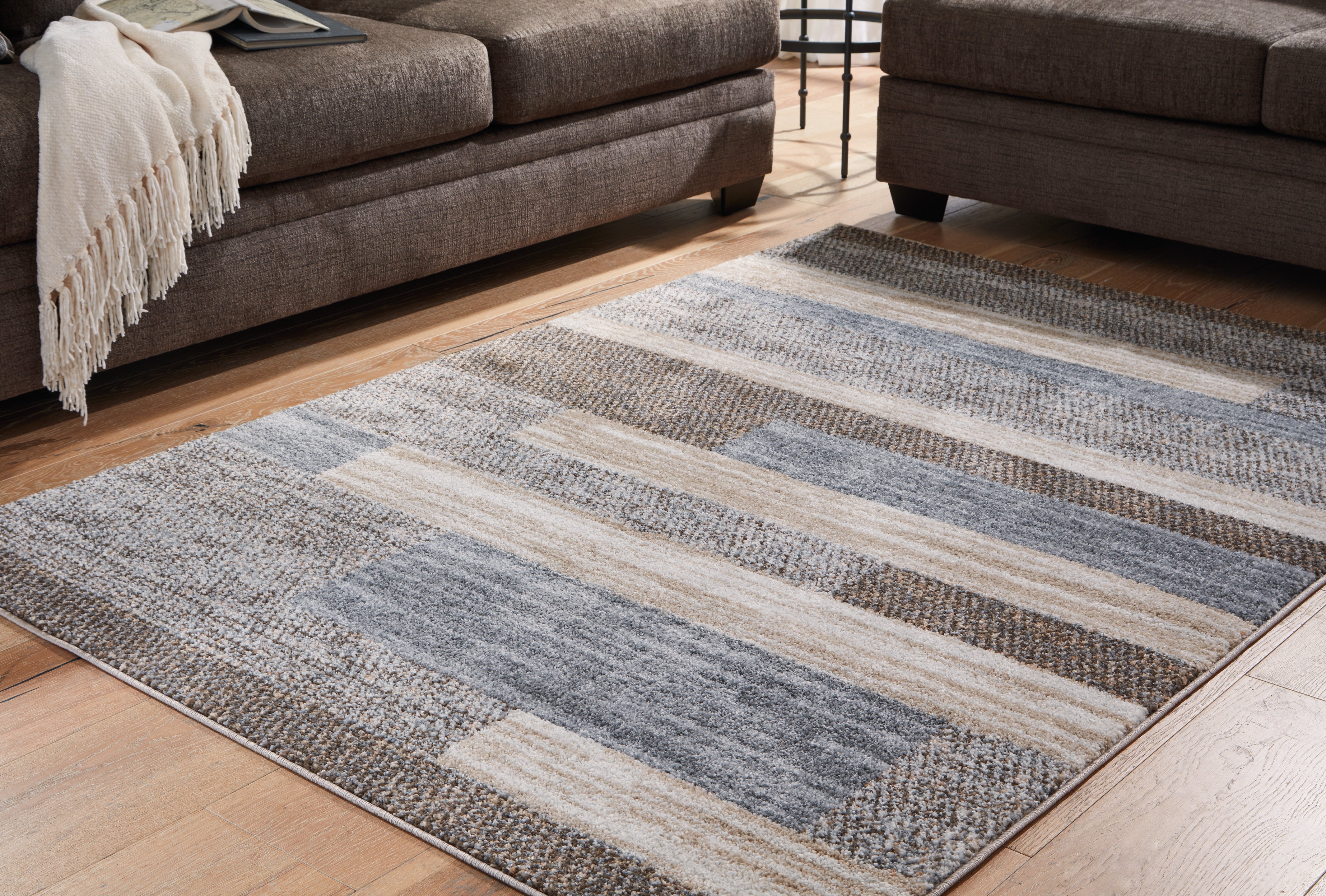 Lullora Furniture - Ashley Furniture - Sethburn Rug - 5' x 7' Rug / Cream/Brown/Gray - R406592