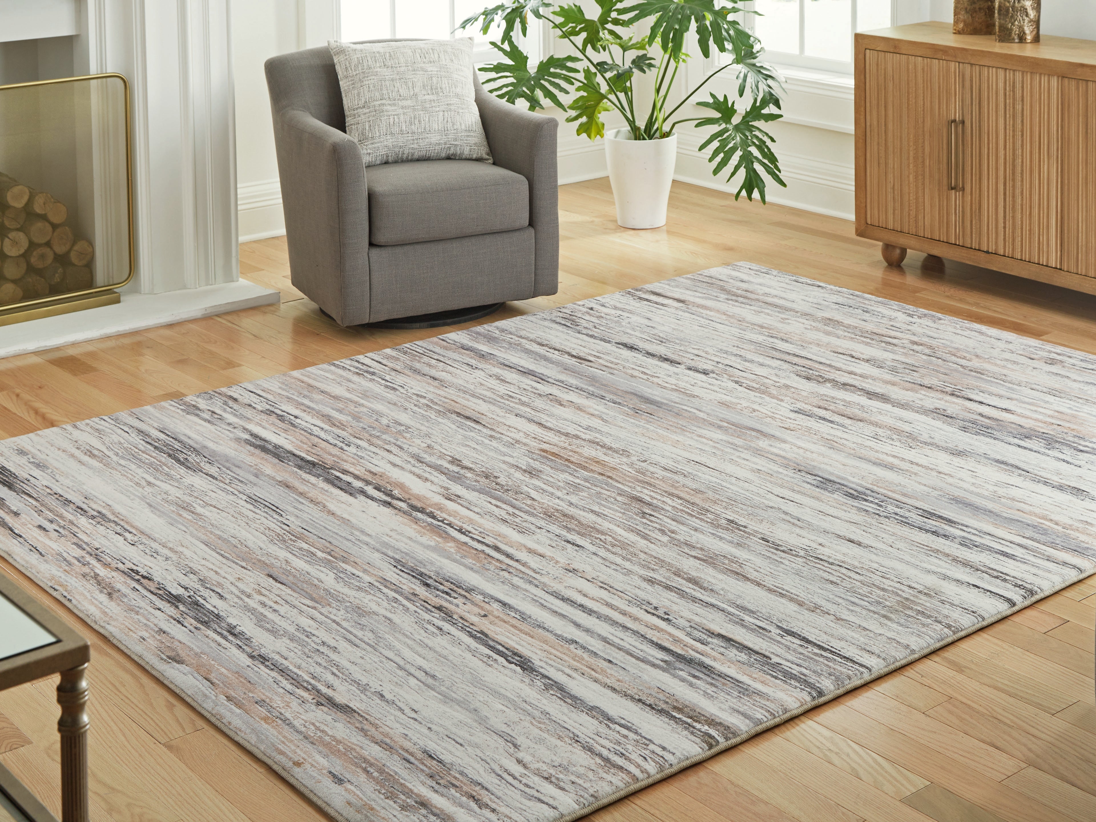 Lullora Furniture - Ashley Furniture - Nace Rug - 7'6" x 9'6" Area Rug / Gray/Brown/White - R407471