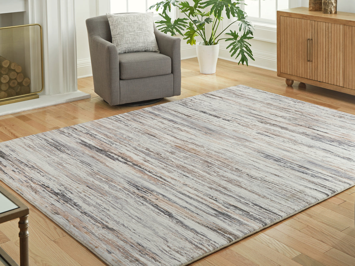 Lullora Furniture - Ashley Furniture - Nace Rug - 7'6" x 9'6" Area Rug / Gray/Brown/White - R407471