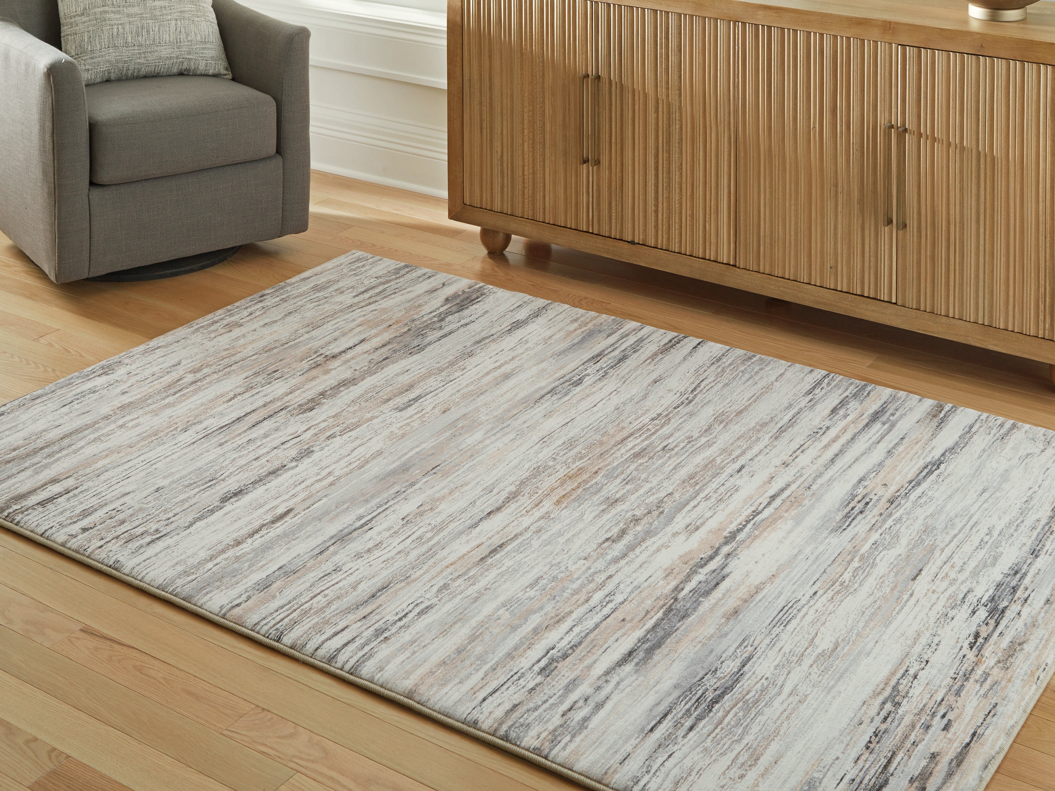 Lullora Furniture - Ashley Furniture - Nace Rug - 5' x 7' Area Rug / Gray/Brown/White - R407472