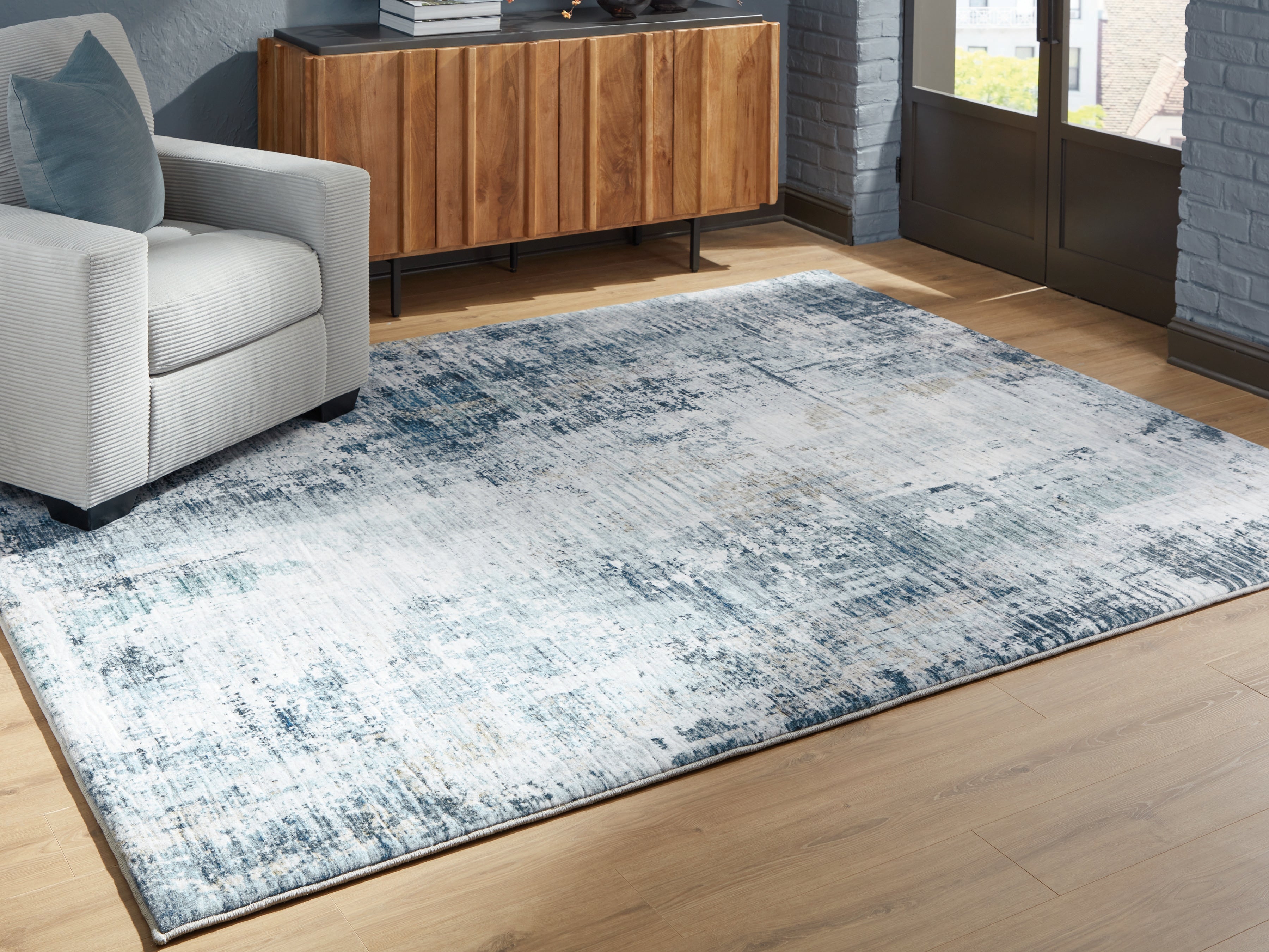 Lullora Furniture - Ashley Furniture - Arlenmont Rug - 7'6" x 9'6" Area Rug / Blue/White/Brown - R407481