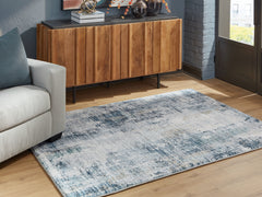 Lullora Furniture - Ashley Furniture - Arlenmont Rug - 7'6" x 9'6" Area Rug / Blue/White/Brown - R407481