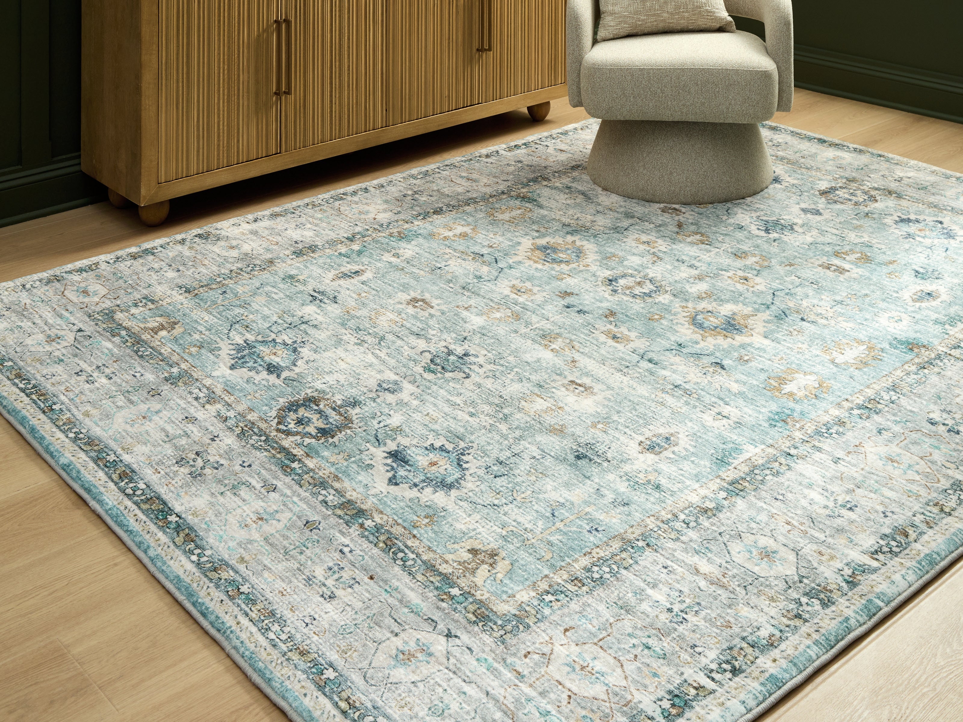 Lullora Furniture - Ashley Furniture - Ladstoney Rug - 7'6" x 9'6" Area Rug / Teal/Beige/Ochre - R407501