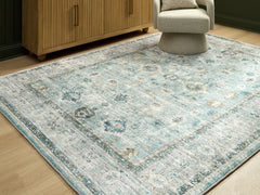 Lullora Furniture - Ashley Furniture - Ladstoney Rug - 7'6" x 9'6" Area Rug / Teal/Beige/Ochre - R407501
