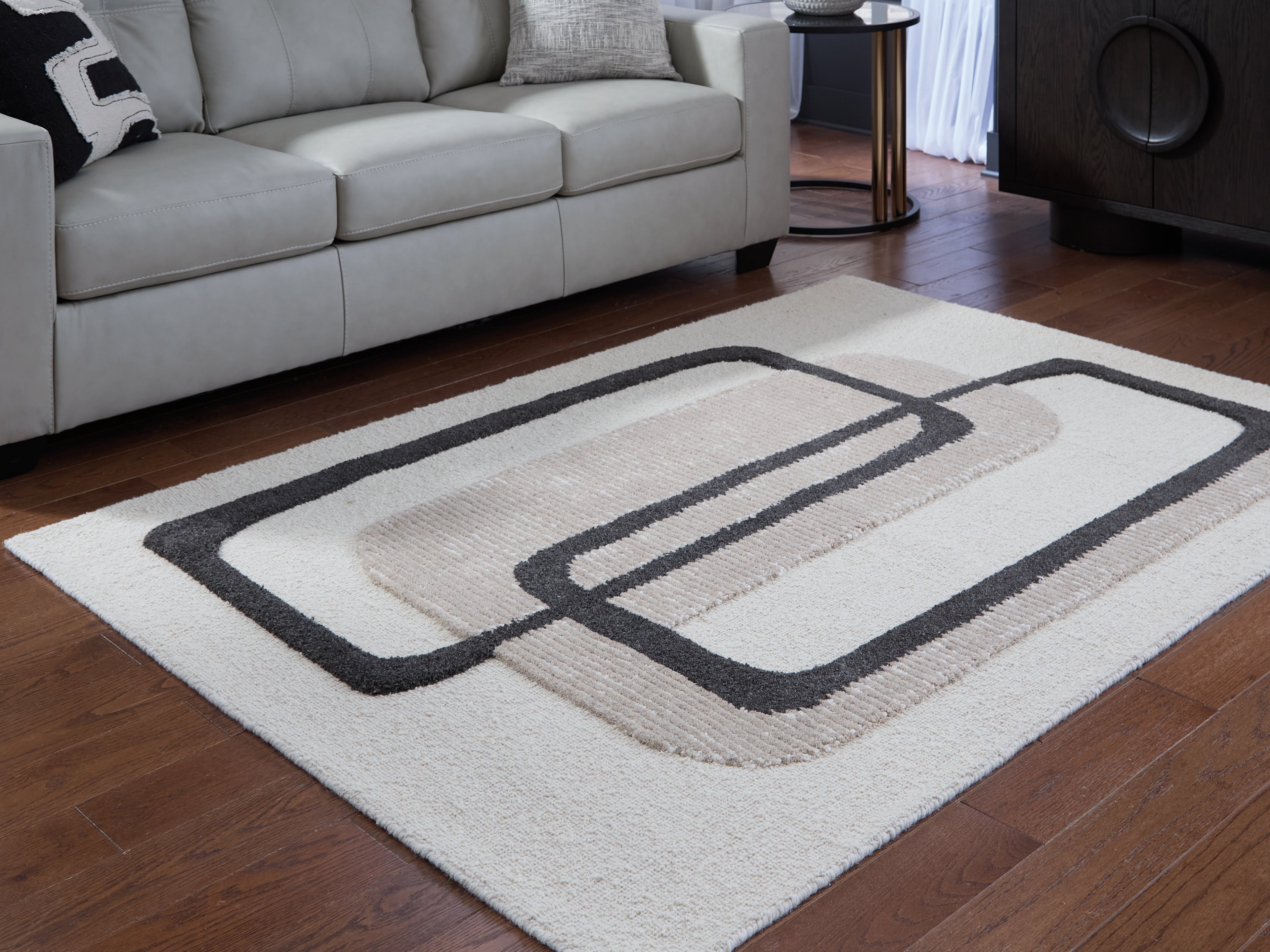 Lullora Furniture - Ashley Furniture - Davismour Rug - 5' x 7' Area Rug / Ivory/Taupe/Charcoal - R407562