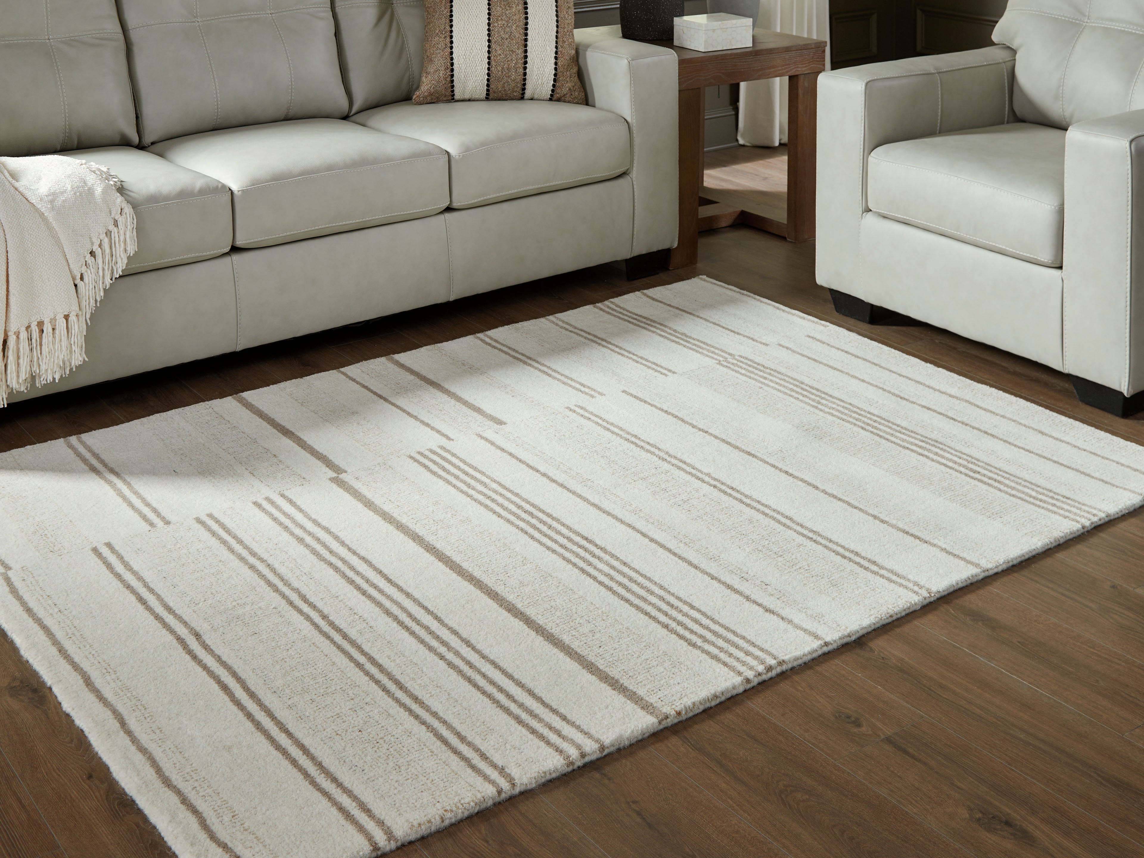 Lullora Furniture - Ashley Furniture - Gadence Rug - 7'8" x 10' Area Rug / Ivory/Tan - R407641