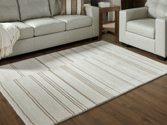 Lullora Furniture - Ashley Furniture - Gadence Rug - 7'8" x 10' Area Rug / Ivory/Tan - R407641