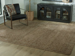 Lullora Furniture - Ashley Furniture - Merrittman Rug - 5' x 7' Area Rug / Brown/Ivory - R407702