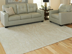 Lullora Furniture - Ashley Furniture - Jaseena Rug - 7'8" x 10' Area Rug / Beige/Tan - R407721