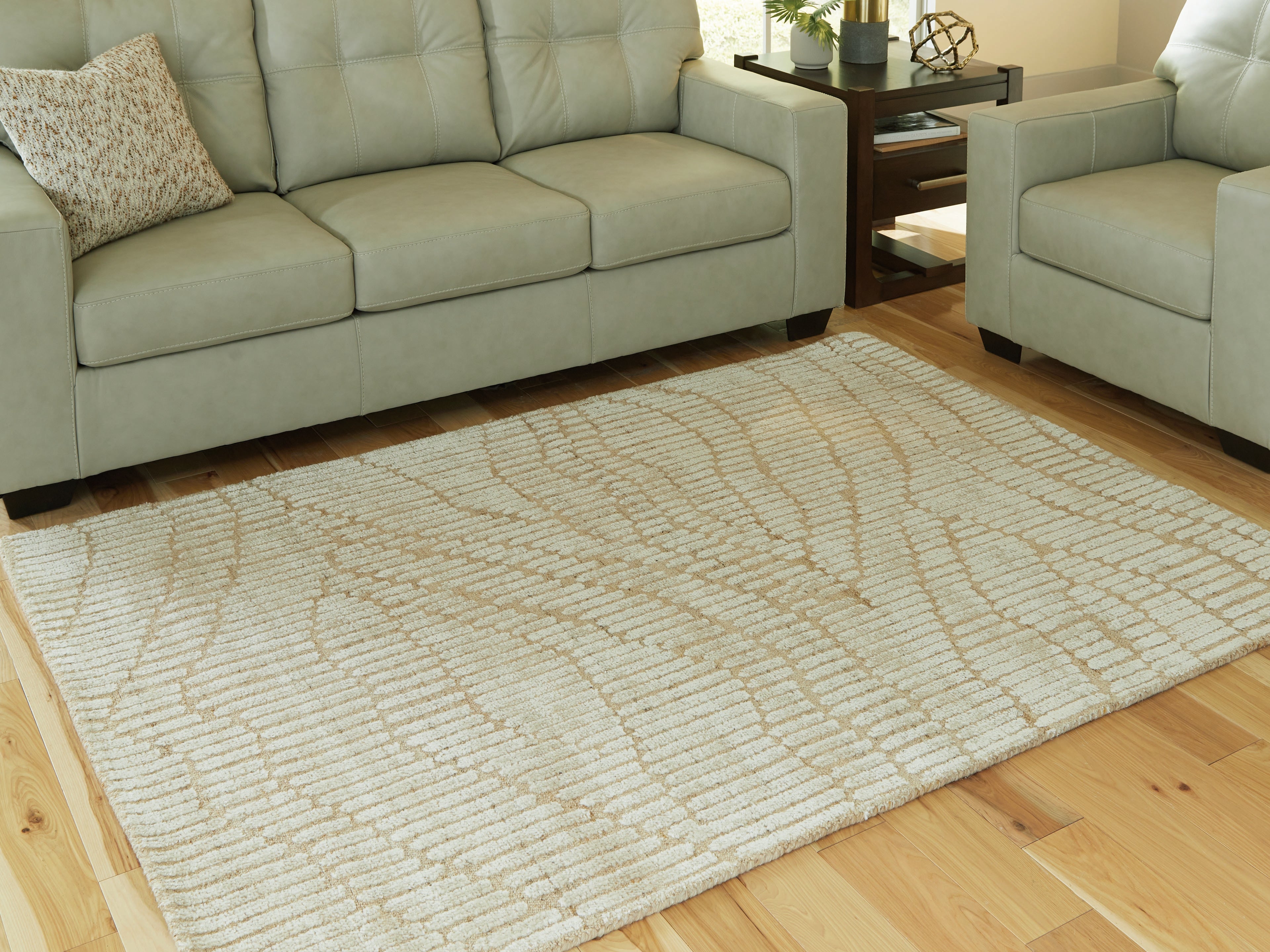Lullora Furniture - Ashley Furniture - Jaseena Rug - 5' x 7' Area Rug / Beige/Tan - R407722