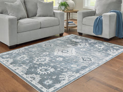 Lullora Furniture - Ashley Furniture - Avanworths Rug - Washable 5'3" x 7' Area Rug / Blue/Gray/Ivory - R407792