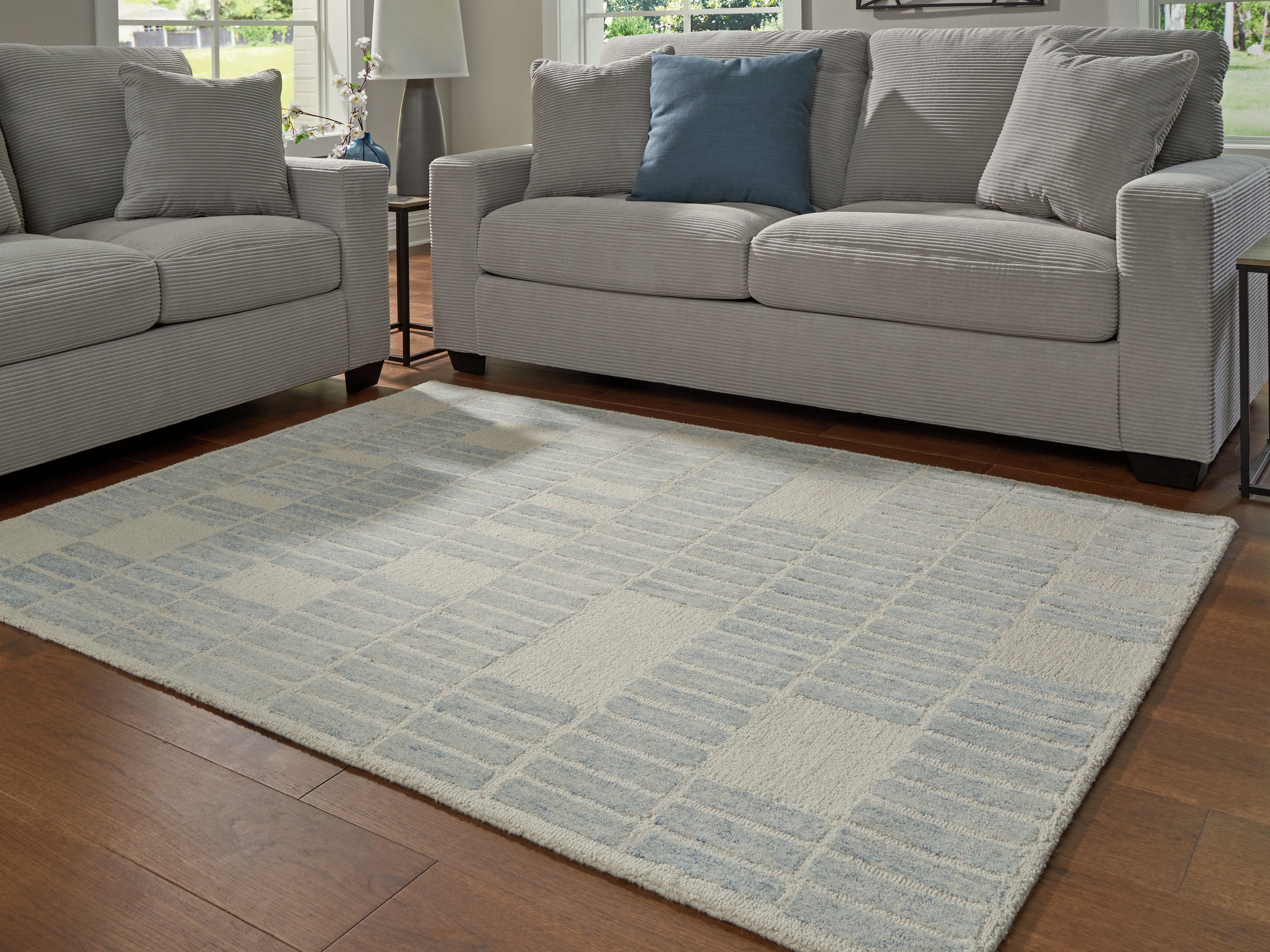 Lullora Furniture - Ashley Furniture - Dylanton Rug - 7'8" x 10' Area Rug / Ivory/Blue - R407811
