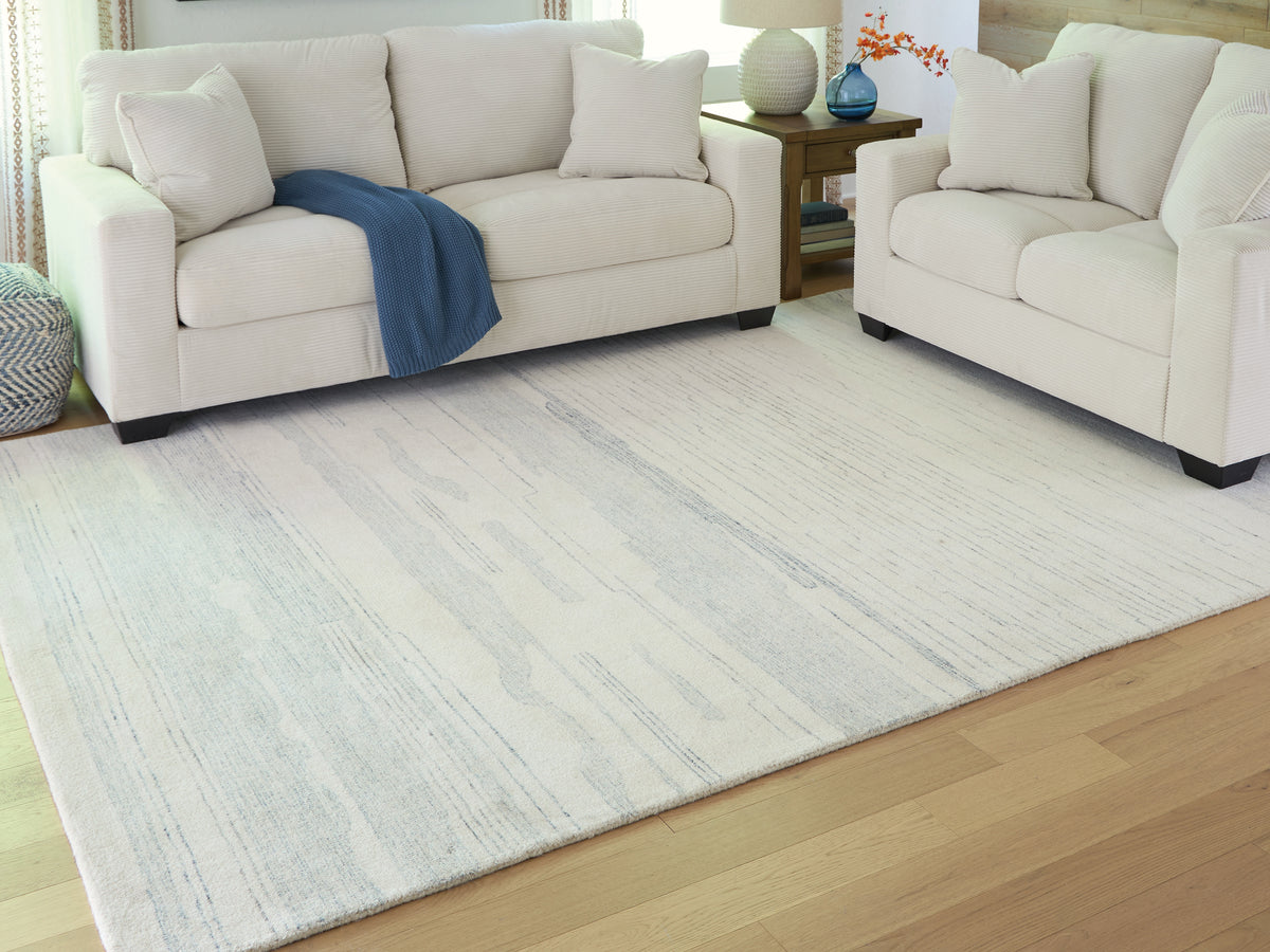 Lullora Furniture - Ashley Furniture - Genemost Rug - 5' x 7' Area Rug / Ivory/Blue - R407842