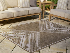 Lullora Furniture - Ashley Furniture - Dunsler Rug - 5' x 7' Rug / Brown/Cream - R900012