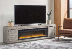 Lullora Furniture - Ashley Furniture - Naydell 92" TV Stand with Electric Fireplace - 92" TV Stand with Electric Fireplace / Gray - W996W1